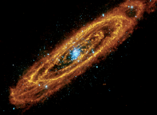 Illustration for article titled How three different types of light reveal the complete beauty of the Andromeda Galaxy